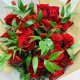 red roses bouquet with leaves and red dry flowers