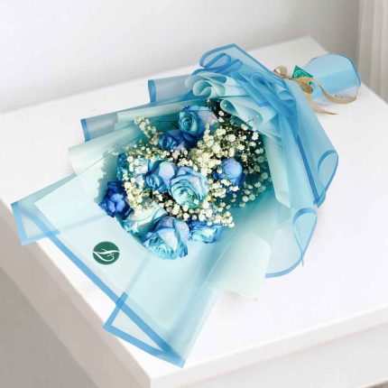 resh 10 blue roses hand bouquet wrapped in elegant luxury blue floral paper, perfect for birthdays, anniversaries, congratulations, and same-day flower delivery across Doha and Qatar.