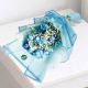 resh 10 blue roses hand bouquet wrapped in elegant luxury blue floral paper, perfect for birthdays, anniversaries, congratulations, and same-day flower delivery across Doha and Qatar.