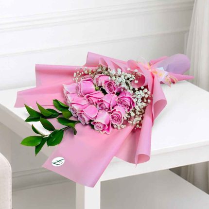 Luxury 12 Pink Roses Hand Bouquet with Baby's Breath in Pink Wrapping | Flower Delivery Qatar