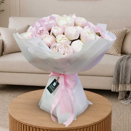 Luxury 50 Light Pink Peony Flower Bouquet with premium fresh blush pink peonies beautifully wrapped for same-day flower delivery in Doha Qatar.