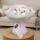 Luxury 50 Light Pink Peony Flower Bouquet with premium fresh blush pink peonies beautifully wrapped for same-day flower delivery in Doha Qatar.