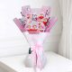 Luxury Kinder Joy bouquet for girls featuring original Kinder Joy chocolates in elegant pink gift wrapping, perfect for birthdays, Children's Day, and same-day delivery in Doha, Qatar.