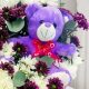 Premium fresh flower arrangement with a soft teddy bear beautifully presented in a handcrafted woven basket. A luxury flower and teddy bear gift combo for birthdays, anniversaries, romantic surprises, congratulations, new baby, and special occasions with same-day delivery across Qatar by Florabella Flowers.