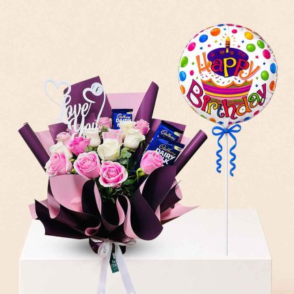 Premium birthday gift combo with fresh pink and white roses bouquet, Dairy Milk chocolates, foam rose teddy bear, and Happy Birthday foil balloon. Perfect birthday surprise with same-day flower and gift delivery across Doha, Qatar.