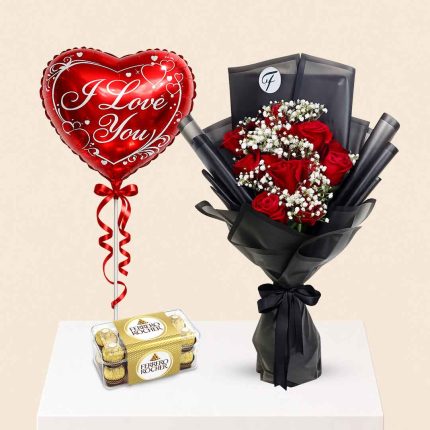 Luxury Ferrero Rocher chocolate gift combo featuring a fresh red roses bouquet and red heart foil balloon with same-day flower delivery in Doha, Qatar. Perfect for birthdays, anniversaries, Valentine's Day, romantic surprises, and special occasions.