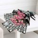 Luxury pink baby rose bouquet made with fresh pink spray roses, beautifully wrapped for birthdays, anniversaries, Mother's Day, Valentine's Day, and same-day flower delivery in Doha, Qatar.