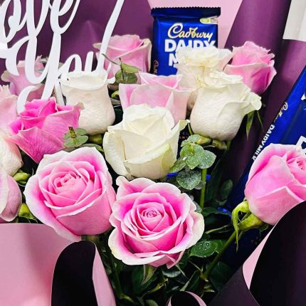 Buy a luxury Pink & White Roses with Dairy Milk Chocolate Bouquet in Qatar