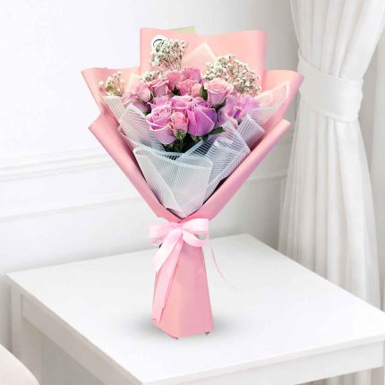 Luxury Rosita Vendela light pink roses bouquet handcrafted with premium fresh roses in elegant pastel wrapping, available for same-day flower delivery across Doha and Qatar.