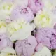 Pink peony flower arrangement in elegant basket – luxury pink flowers delivery in Qatar