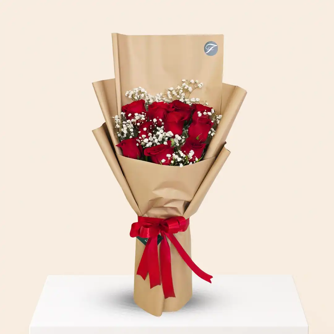 10 Red Rose Bouquet – Fresh Red Roses Qatar 10 red roses bouquet wrapped in elegant luxury paper – red rose bouquet Qatar
