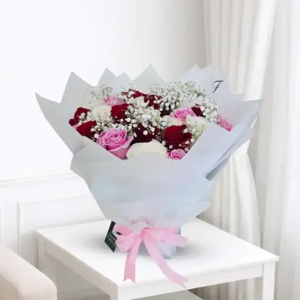 Mixed colour rose bouquet with fresh red, pink, white roses in Qatar