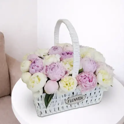 Pink peony flower arrangement in elegant basket – luxury pink flowers delivery in Qatar