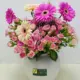 Gerbera and baby roses mixed vase with elegant pink flowers in Qatar