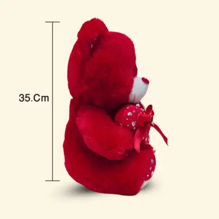 Red teddy bear soft toy gift with optional flowers and gift wrapping available at Florabella Flowers Qatar