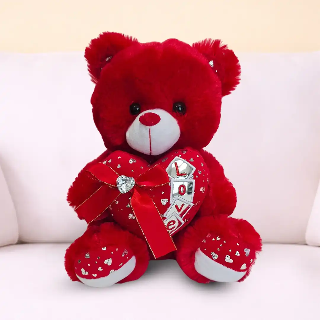 Red Teddy Bear Soft Toy – Gift with Flowers in Qatar Red teddy bear soft toy gift with optional flowers and gift wrapping available at Florabella Flowers Qatar