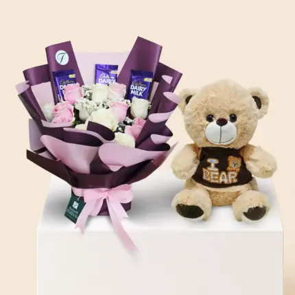 Mixed colour rose bouquet with chocolates and beige soft toy teddy bear combo gift from Florabella Flowers Qatar